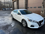 2019 Nissan Altima AWD for sale, great condition, low mileage, white color with new tires and updated sound system.